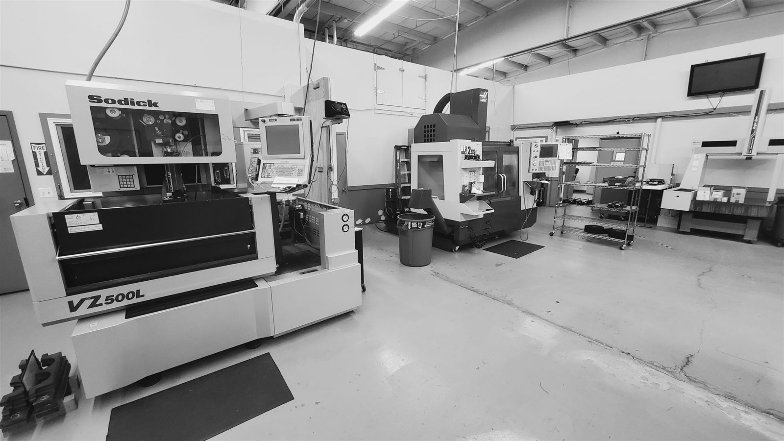 Reformed Manufacturing shop with wire EDM and CNC machining equipment